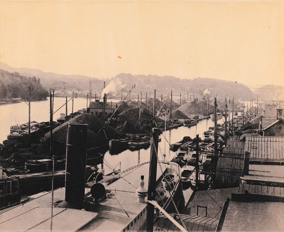 Island Dock, and barges loaded with coal, 